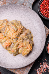 Delicious boiled beef or pork tongue sliced with carrots, onions, sour cream