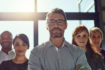 Leadership, management and portrait of business people in office together for collaboration. Confidence, diversity and face of employee team in professional workplace for company mission or vision © SometimesNever/peopleimages.com