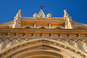 Obraz premium Sunset view of the Sacred Heart of Jesus Church (Iglesia del Sagrado Corazon de Jesus) is the only neo-Gothic work that has been built in the old town of Malaga, Costa del Sol, Andalusia, Spain.