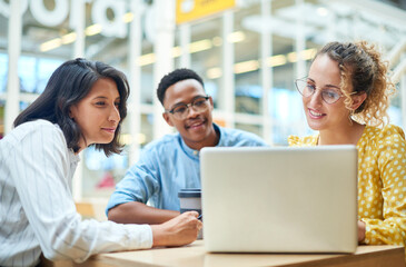 Laptop, diversity and team of business people planning, problem solving or brainstorming ideas....