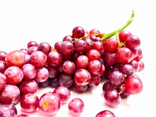 red grapes isolated on white