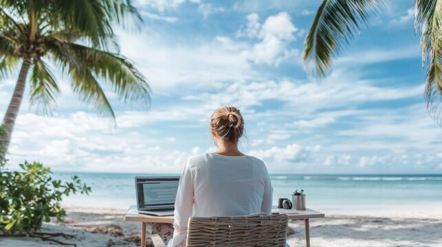Digital nomad working on website development at a beach remote work lifestyle