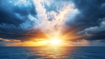 Fototapeta premium Sun rays breaking through dark storm clouds over the ocean dramatic weather