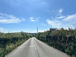 A view of an empty lane on a beautiful english day