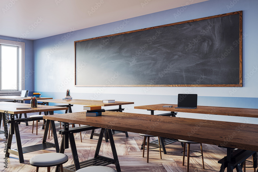 Poster classroom with wooden desks, large chalkboard, and window light. 3d rendering