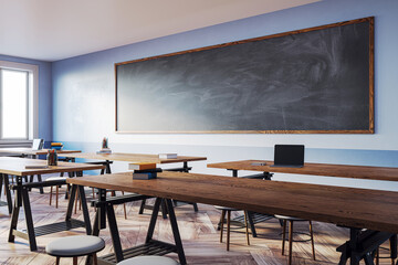 Classroom with wooden desks, large chalkboard, and window light. 3D Rendering