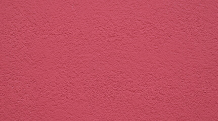 Fototapeta premium Rot gestrichene Hauswand, farbiger Putz, Fassade, Wand, bemalte Hausfassade, rot