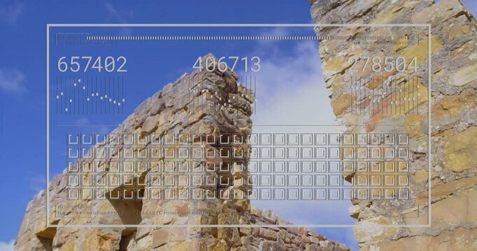Digital data processing animation over ancient stone ruins and blue sky