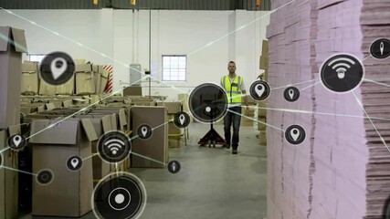 Warehouse worker moving boxes, network of connections and data animation over scene - Powered by Adobe