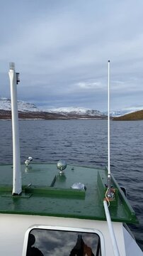 mountain view from a tourist boat on Lake Kilpisjarvi