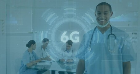 6G technology animation over medical professionals discussing in hospital setting - Powered by Adobe