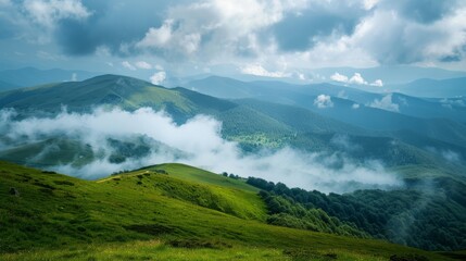 Scenic view of green mountains and drifting clouds