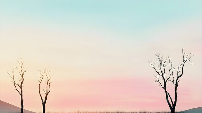 A barren landscape featuring dry trees silhouetted against a pastel sky, with ample copy space for text