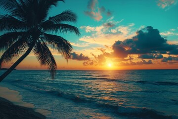 A picturesque tropical beach scene with a silhouetted palm tree, waves, and a stunning sunset over the ocean horizon.