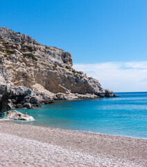 Beach, sea and rocky coast on the island of Rhodes in Greece