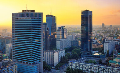 Cityscape at sunset - top view of the Downtown district of Warsaw with high-rise buildings, located...