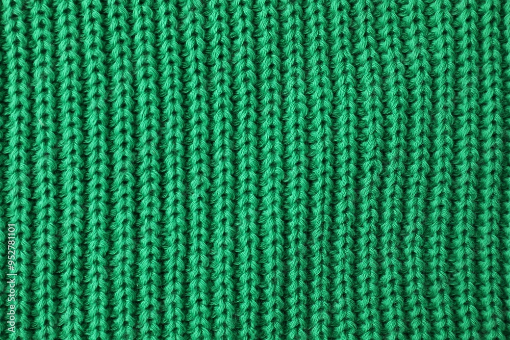 Sticker Texture of green knitted fabric as background, top view