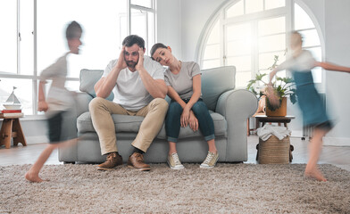 Frustrated parents, children and chaos with hyperactive siblings running in living room at home....