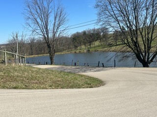 country road with lake