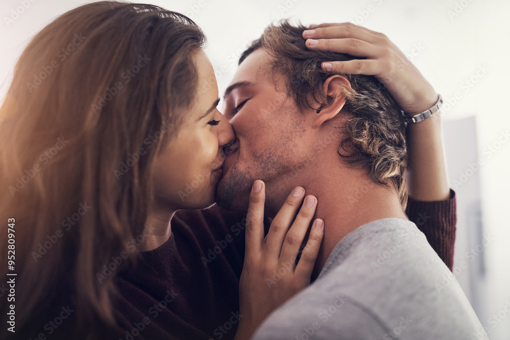 Sticker Kiss, love and couple in kitchen with embrace, morning bonding together and affection in home. Romance, happy man and woman hug with care, connection and relax with relationship support in apartment