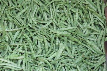 close up of green beans in the market