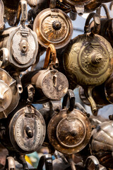 Collection of dozens of brass coffee pots and teapots