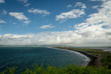 Rossbeigh Beach is a spit of sand, in the village of Glenbeigh, County Kerry, Ireland.