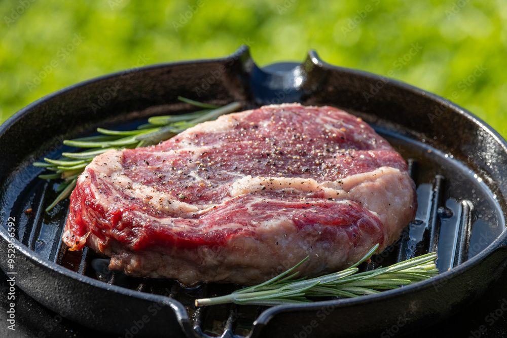 Canvas Prints raw beef steak with pepper on grill pan