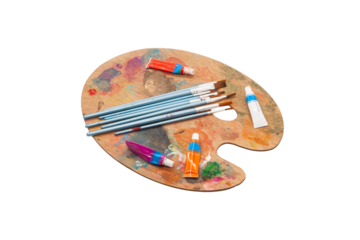 Artistic wooden palette with colorful paints and brushes for creative activities. Horizontal. PNG