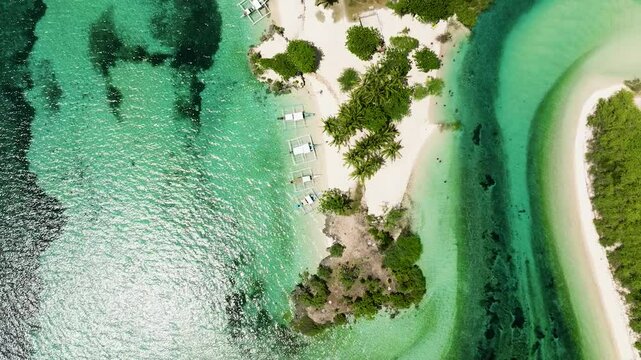 Seascape with tropical sandy beach. Balidbid Lagoon, Bantayan island, Philippines.