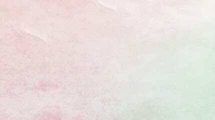 Fototapeta premium Watercolor paint is blending on textured paper, creating a gradient from pink to green. This background would be ideal for a design project