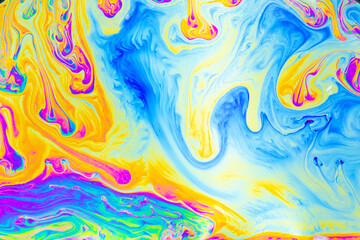 Psychedelic multicolored background abstract. Rainbow colors. patterns background. Photo macro shot of soap bubbles