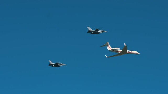 military aircraft jets having a test flight on a sunny day. High quality 4k footage