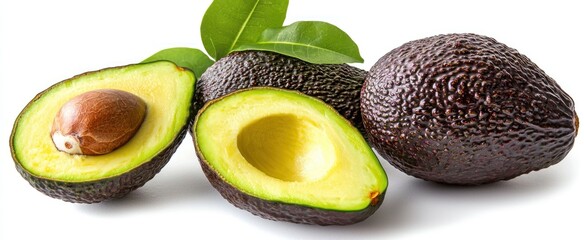 Three Avocados, One Cut Open, with Green Leaves