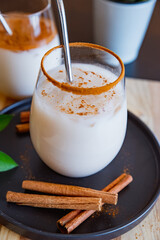 Horchata with cinnamon and coffee in a glass in Coffee Shop