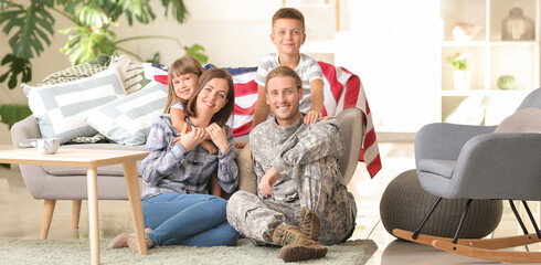 Happy military man with his family at home