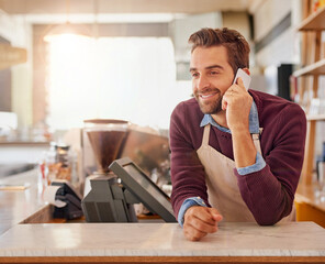 Businessman, barista and cafe with phone call for online order, service or conversation at coffee...