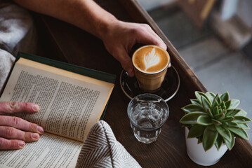 Coffee, Cortado, Latte with Latte art in Cozy Coffee Shop with Plants and Flowers