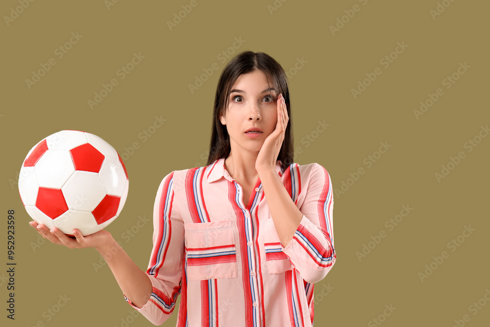 Poster surprised young woman with soccer ball on color background