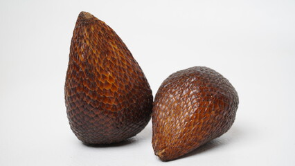 Fresh ripe salak fruit or snakefruit isolated on white background