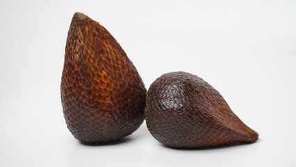 Fresh ripe salak fruit or snakefruit isolated on white background