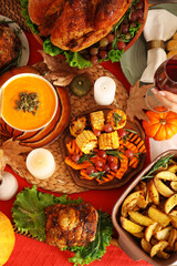 Festive table setting with tasty food for Thanksgiving Day, top view