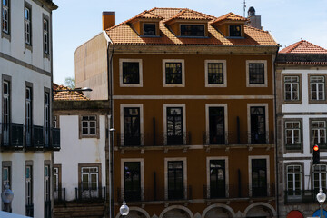 View of the city of Porto. Characteristic architecture of Porto, Vila Nova de Gaia, Portugal. Urban landscape along the river. Houses and buildings