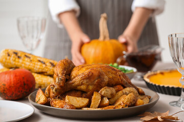 Festive table setting with tasty turkey for Thanksgiving Day, closeup