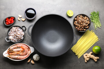 Ingredients for wok on grey table, flat lay