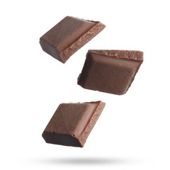 Pieces of sweet chocolate falling on white background