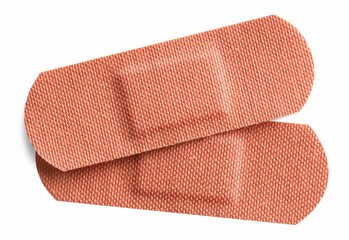 Medical adhesive bandages isolated on white, top view