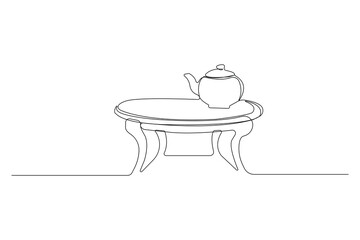 Teapot on a table continuous line art drawing. Vector illustration.