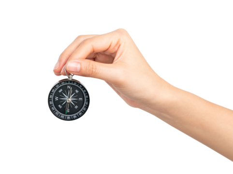 Hand holding compass on isolated white background.