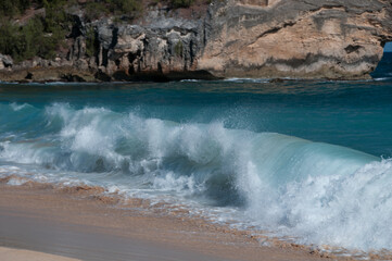 Waves on a beach in Poipu Kauai Hawaii during the Day